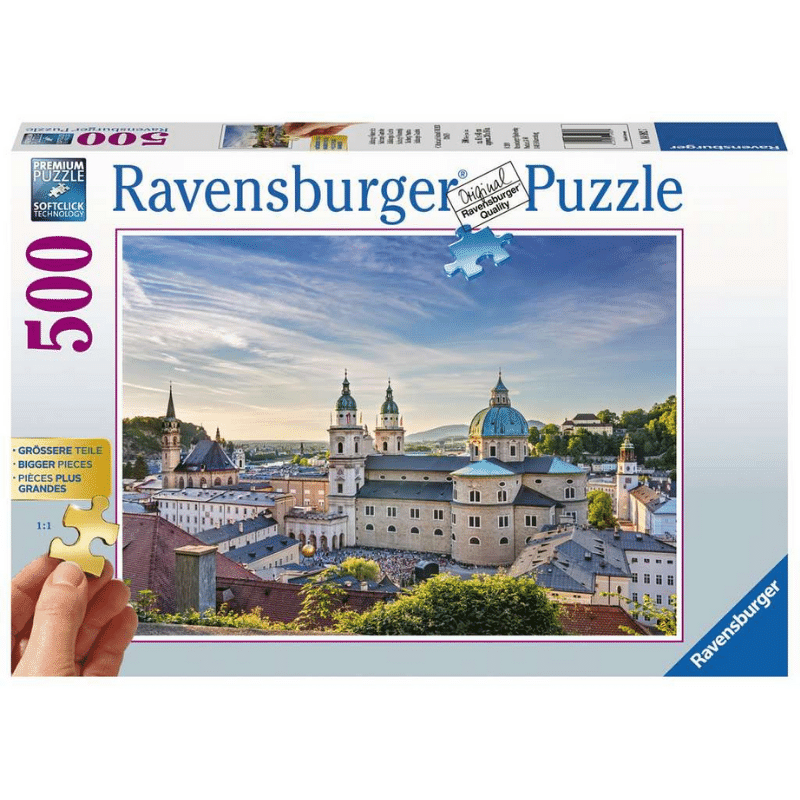 Ravensburger adult puzzle featuring a scenic view of Salzburg, Austria with historic buildings and lush landscape.