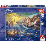 Adult puzzle featuring Disney's Thomas Kinkade The Little Mermaid by Schmidt, showing colorful underwater scene with Ariel and sea creatures.