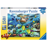 Children's underwater puzzle by Ravensburger showing vibrant ocean scene with colorful marine life and coral reefs.