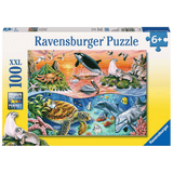 Children's underwater puzzle by Ravensburger featuring colorful ocean scene with fish, coral, and marine life.